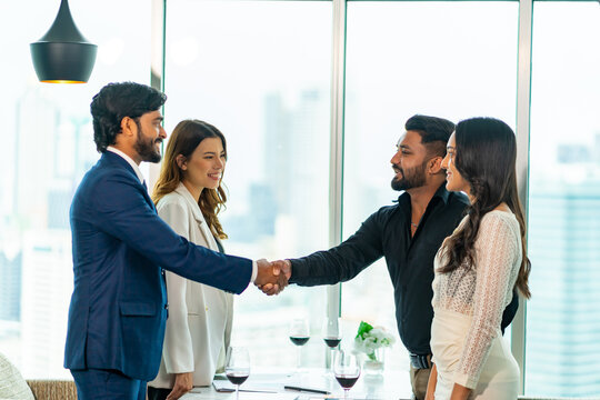 Business partners shaking hands